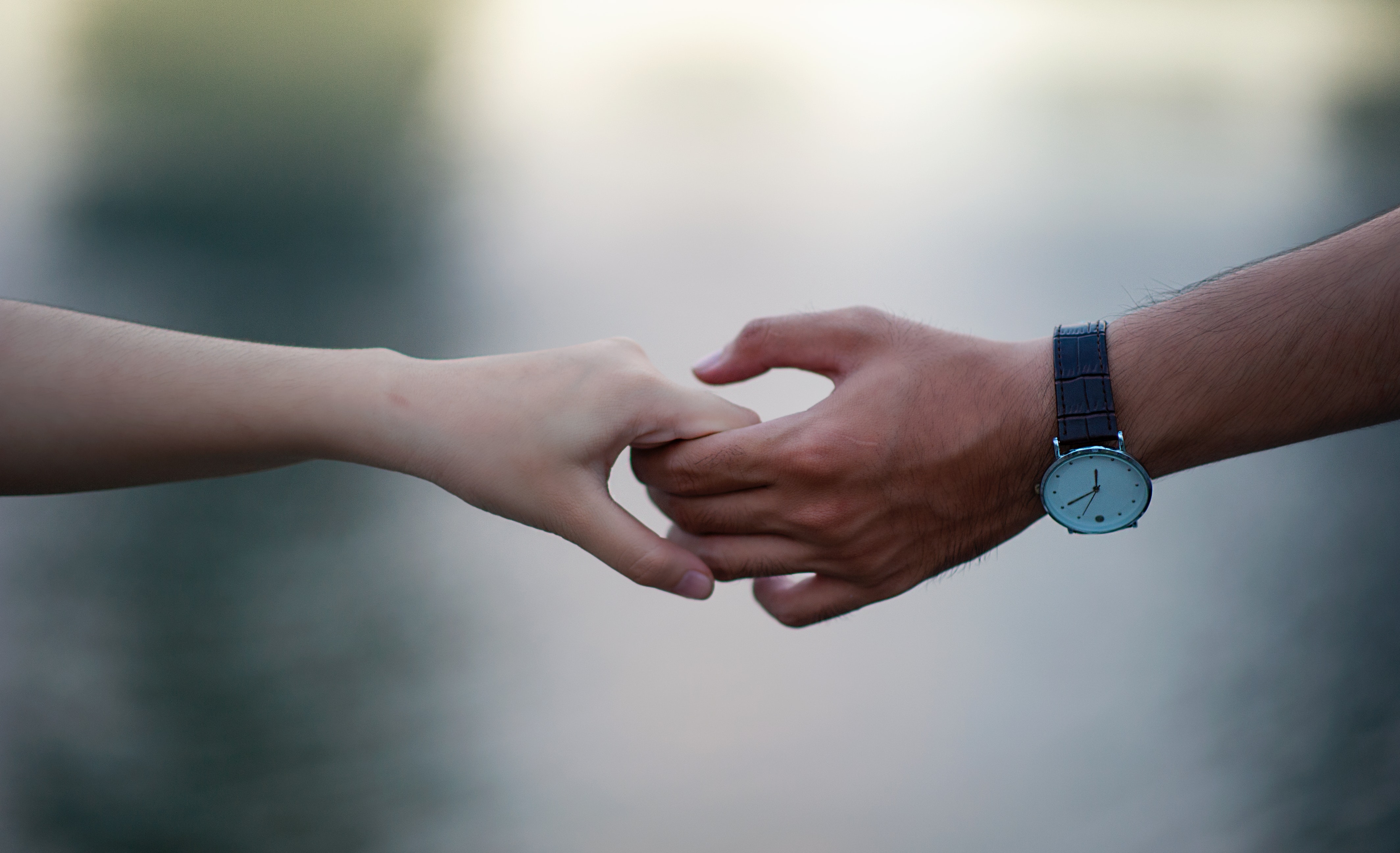 blurred-background-hands-holding-hands-715807.jpg
